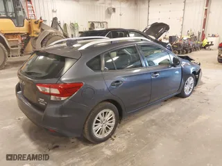2017 Subaru Impreza Premium with VIN 4S3GTAD67H3750922, listed as a IAAI auction lot 41875427 with 160,241 mi miles. Bid and sale history available at carsss.com. Image 4.