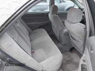 2004 Toyota Camry LE z VIN 4T1BE32K64U896809, wystawiony jako IAAI lot #41075176 z przebiegiem 223 763 mil mil oraz . Historia ofert i sprzedaży dostępna na DreamBid. Obrazek 8.