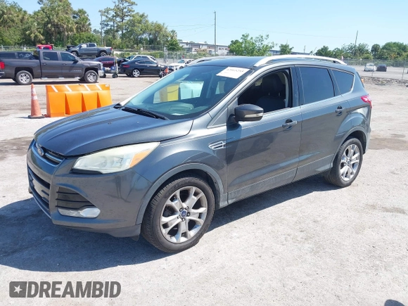 2016 Ford Escape Titanium with VIN 1FMCU0J95GUB11995, listed as a IAAI auction lot 42065255 with 142,390 mi miles. Bid and sale history available at carsss.com. Image 2.