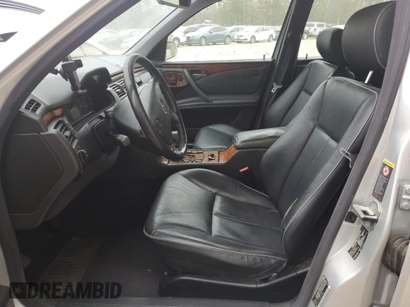 2002 Mercedes-Benz E-Class with VIN WDBJF65J12B499887, listed as a Copart auction lot 48708375 with 194,556 mi miles and Salvage Title. Bid and sale history available at carsss.com. Image 7.
