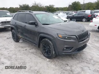 2022 Jeep Cherokee X with VIN 1C4PJMCX0ND538919, listed as a IAAI auction lot 41321416 with 65,577 mi miles. Bid and sale history available at carsss.com. Image 1.