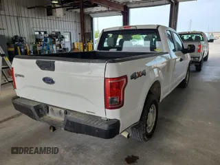 2015 Ford F-150 XLT z VIN 1FTFX1EF0FKE89795, wystawiony jako IAAI lot #42610200 z przebiegiem 87 650 mil mil oraz . Historia ofert i sprzedaży dostępna na DreamBid. Obrazek 29.