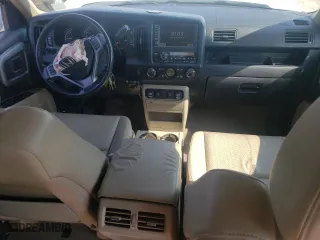 2009 Honda Ridgeline RTL with VIN 5FPYK16589B100942, listed as a Copart auction lot 69424014 with 211,003 mi miles and Salvage Title. Bid and sale history available at carsss.com. Image 8.
