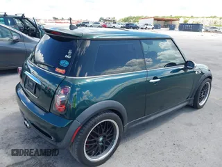 2005 MINI Hardtop S with VIN WMWRE33465TD95560, listed as a IAAI auction lot 42609791 with 133,997 mi miles and . Bid and sale history available at DreamBid. Image 4.