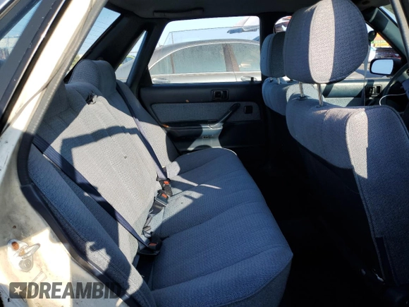 1990 Toyota Camry z VIN JT2SV21E3L0349179, wystawiony jako Copart lot #75125234 z przebiegiem 138 635 mil mil oraz Czysty tytuł • Clean title. Historia ofert i sprzedaży dostępna na DreamBid. Obrazek 10.