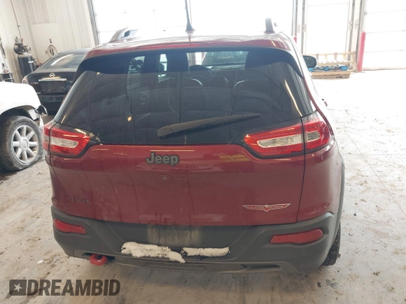 2016 Jeep Cherokee Trailhawk with VIN 1C4PJMBBXGW135138, listed as a IAAI auction lot 41595718 with 267,058 mi miles and . Bid and sale history available at DreamBid. Image 16.