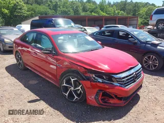 2021 Volkswagen Passat R-Line z VIN 1VWMA7A35MC018284, wystawiony jako IAAI lot #42261290 z przebiegiem 85 255 mil mil oraz . Historia ofert i sprzedaży dostępna na DreamBid. Obrazek 6.