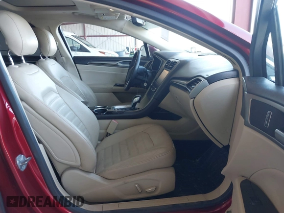 2013 Ford Fusion SE Hybrid z VIN 3FA6P0LU9DR183625, wystawiony jako IAAI lot #42338533 z przebiegiem 159 546 mil mil oraz . Historia ofert i sprzedaży dostępna na DreamBid. Obrazek 5.