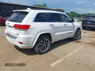 2018 Jeep Grand Cherokee High Altitude с VIN 1C4RJECG5JC260436, выставлен на аукционе IAAI как лот 42572550 с пробегом 88 031 миль миль и . История ставок и продаж доступна на DreamBid. Изображение 4.