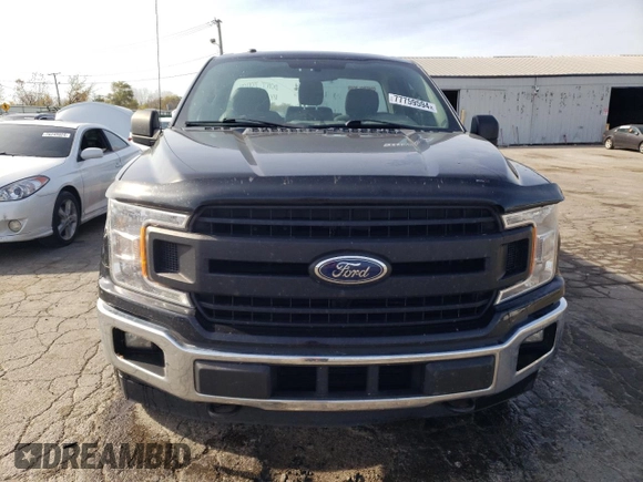 2018 Ford F-150 XL with VIN 1FTMF1EP0JKC60951, listed as a Copart auction lot 77759594 with 152,604 mi miles and Salvage title. Bid and sale history available at DreamBid. Image 5.