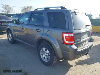 2011 Ford Escape Limited with VIN 1FMCU0EG0BKA82063, listed as a IAAI auction lot 41993781 with 156,991 mi miles. Bid and sale history available at carsss.com. Image 3.