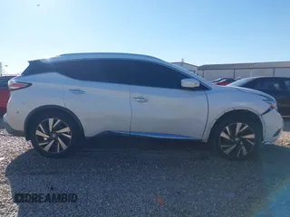 2015 Nissan Murano Platinum z VIN 5N1AZ2MG7FN265552, wystawiony jako IAAI lot #41828490 z przebiegiem 211 465 mil mil oraz . Historia ofert i sprzedaży dostępna na DreamBid. Obrazek 13.