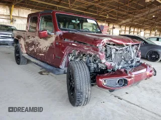 2021 Jeep Gladiator High Altitude with VIN 1C6HJTFG6ML535531, listed as a Copart auction lot 54349305 with 104,173 mi miles and Salvage title. Bid and sale history available at DreamBid. Image 4.