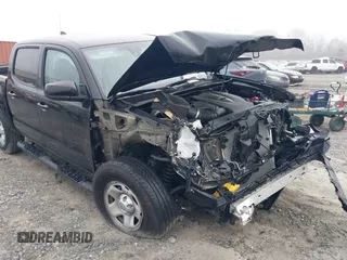 2023 Toyota Tacoma SR with VIN 3TMCZ5AN3PM633643, listed as a IAAI auction lot 41787399 with 4,313 mi miles and . Bid and sale history available at DreamBid. Image 6.