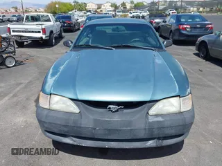 1997 Ford Mustang with VIN 1FALP4049VF200422, listed as a IAAI auction lot 42073947 with 157,937 mi miles. Bid and sale history available at carsss.com. Image 13.