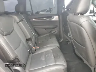 2021 Cadillac XT6 Premium Luxury z VIN 1GYKPCRS1MZ169952, wystawiony jako Copart lot #51908895 z przebiegiem 31 834 mil mil oraz Szkody całkowita. Historia ofert i sprzedaży dostępna na DreamBid. Obrazek 11.