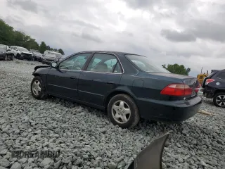 2000 Honda Accord EX z VIN 1HGCG1659YA073599, wystawiony jako Copart lot #58899565 z przebiegiem 389 828 mil mil oraz Szkoda całkowita • Salvage title. Historia ofert i sprzedaży dostępna na DreamBid. Obrazek 2.