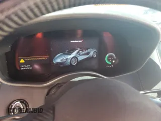 2019 McLaren 570S z VIN SBM13FAA9KW006456, wystawiony jako Copart lot #77400754 z przebiegiem Nie podano mil oraz Nie do naprawy. Historia ofert i sprzedaży dostępna na DreamBid. Obrazek 9.