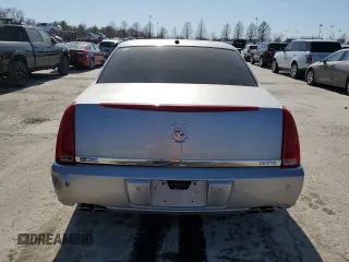 2007 Cadillac DTS V8 z VIN 1G6KD57Y87U140129, wystawiony jako Copart lot #48025875 z przebiegiem 184 526 mil mil oraz Szkody całkowita. Historia ofert i sprzedaży dostępna na DreamBid. Obrazek 6.