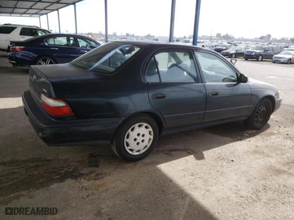 1997 Toyota Corolla with VIN 1NXBA02E5VZ664241, listed as a Copart auction lot 46717085 with 212,976 mi miles and Salvage Title. Bid and sale history available at carsss.com. Image 3.
