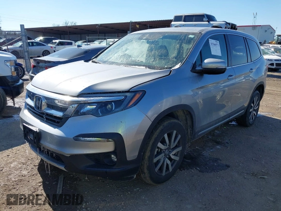 2022 Honda Pilot EX-L with VIN 5FNYF6H54NB018613, listed as a IAAI auction lot 41566973 with 56,173 mi miles. Bid and sale history available at carsss.com. Image 2.