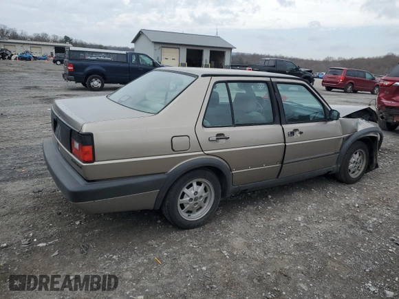1991 Volkswagen Jetta z VIN WVWRA21G1MW029277, wystawiony jako Copart lot #50025755 z przebiegiem 429 079 mil mil oraz Szkoda całkowita • Salvage title. Historia ofert i sprzedaży dostępna na DreamBid. Obrazek 3.