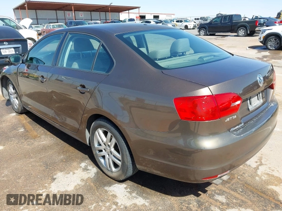 2014 Volkswagen Jetta S with VIN 3VW2K7AJ8EM319182, listed as a IAAI auction lot 42180101 with 133,495 mi miles and . Bid and sale history available at DreamBid. Image 3.