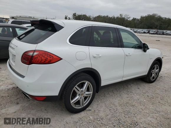 2012 Porsche Cayenne S Hybrid z VIN WP1AE2A20CLA92536, wystawiony jako Copart lot #87667355 z przebiegiem 117 267 mil mil oraz Czysty tytuł • Clean title. Historia ofert i sprzedaży dostępna na DreamBid. Obrazek 3.