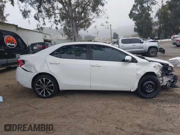 2019 Toyota Corolla L with VIN 5YFBURHE3KP895705, listed as a IAAI auction lot 42034995 with 173,719 mi miles and . Bid and sale history available at DreamBid. Image 14.