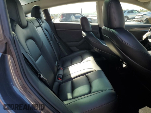 2023 Tesla Model 3 with VIN 5YJ3E1EA7PF456613, listed as a Copart auction lot 56940255 with 35,920 mi miles and Non repairable. Bid and sale history available at DreamBid. Image 10.