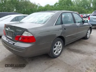 2003 Toyota Avalon XL with VIN 4T1BF28B53U285411, listed as a IAAI auction lot 42140722 with 282,407 mi miles and . Bid and sale history available at carsss.com. Image 4.