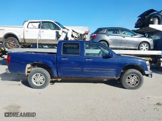 2011 GMC Canyon SLE1 with VIN 1GTH6MFE3B8123808, listed as a IAAI auction lot 41297090 with 142,877 mi miles. Bid and sale history available at carsss.com. Image 13.