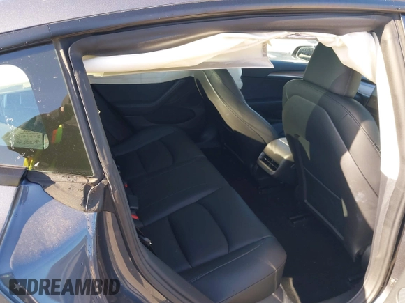 2023 Tesla Model 3 z VIN 5YJ3E1EA1PF681030, wystawiony jako IAAI lot #41545960 z przebiegiem 19 590 mil mil oraz . Historia ofert i sprzedaży dostępna na DreamBid. Obrazek 8.