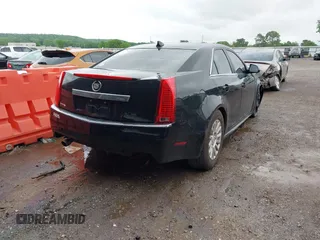 2012 Cadillac CTS with VIN 1G6DA5E58C0112066, listed as a IAAI auction lot 42128544 with 150,860 mi miles and . Bid and sale history available at DreamBid. Image 4.