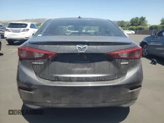 2014 Mazda 3 S Touring with VIN JM1BM1V39E1145478, listed as a Copart auction lot 57860645 with 55,322 mi miles and Salvage title. Bid and sale history available at DreamBid. Image 6.