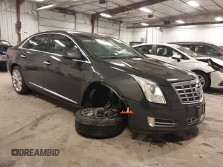 2013 Cadillac XTS Luxury with VIN 2G61R5S32D9101909, listed as a IAAI auction lot 41461611 with 110,603 mi miles. Bid and sale history available at carsss.com. Image 1.