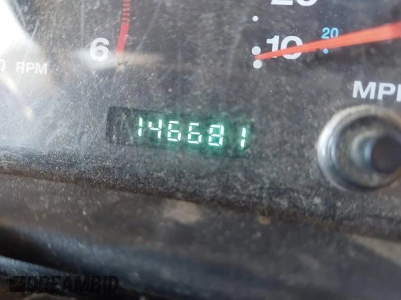 2004 Jeep Wrangler Sport Right Hand Drive with VIN 1J4F449SX4P780560, listed as a IAAI auction lot 41645721 with 146,681 mi miles. Bid and sale history available at carsss.com. Image 15.