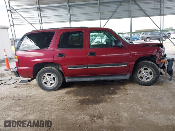 2005 Chevrolet Tahoe LS with VIN 1GNEC13V35R103563, listed as a IAAI auction lot 42645990 with 319,891 mi miles and . Bid and sale history available at DreamBid. Image 13.