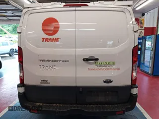 2021 Ford Transit Cargo with VIN 1FTBR2YG2MKA51800, listed as a IAAI auction lot 42793917 with 61,733 mi miles and . Bid and sale history available at DreamBid. Image 36.