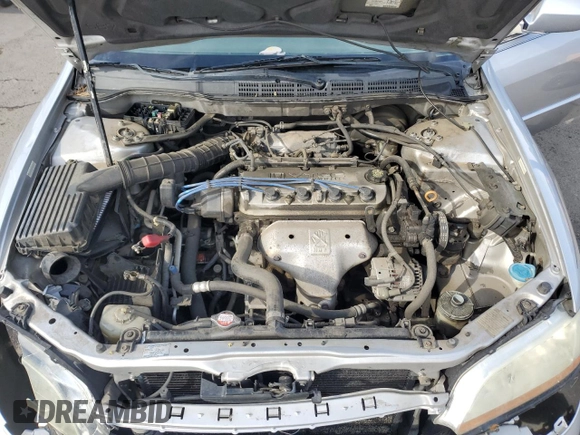 2002 Honda Accord LX z VIN JHMCG56442C016427, wystawiony jako Copart lot #57806335 z przebiegiem 176 816 mil mil oraz Szkoda całkowita • Salvage title. Historia ofert i sprzedaży dostępna na DreamBid. Obrazek 11.