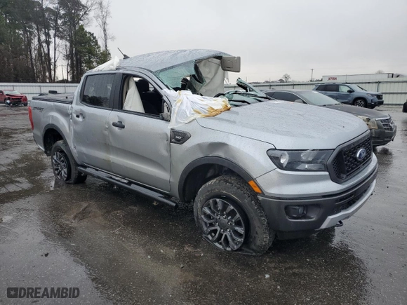 2023 Ford Ranger XL with VIN 1FTER4FH3PLE14401, listed as a Copart auction lot 41427785 with 18,492 mi miles and Salvage Title. Bid and sale history available at carsss.com. Image 4.