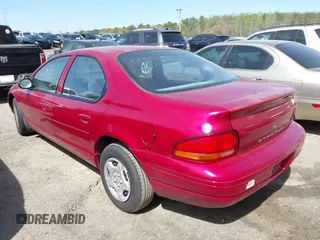 1998 Dodge Stratus with VIN 1B3EJ46X9WN334135, listed as a IAAI auction lot 41896890 with 142,215 mi miles and . Bid and sale history available at DreamBid. Image 3.