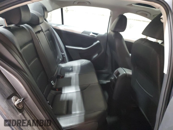 2013 Volkswagen Jetta SE z VIN 3VWDX7AJ7DM450368, wystawiony jako Copart lot #87016754 z przebiegiem 126 156 mil mil oraz Czysty tytuł • Clean title. Historia ofert i sprzedaży dostępna na DreamBid. Obrazek 10.