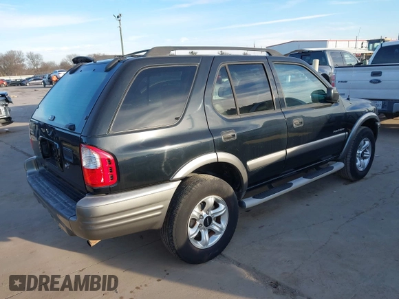 2002 Isuzu Rodeo S with VIN 4S2CK58WX24339782, listed as a IAAI auction lot 41340277 with 154,240 mi miles. Bid and sale history available at carsss.com. Image 4.