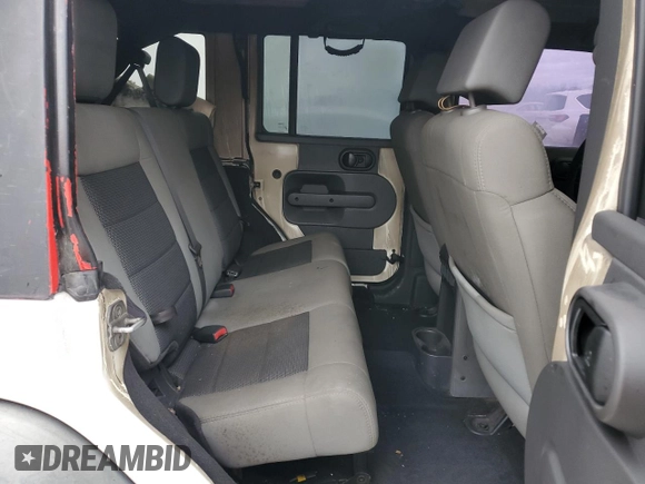 2010 Jeep Wrangler Unlimited Rubicon z VIN 1J4HA6H13AL202972, wystawiony jako Copart lot #46494505 z przebiegiem Nie podano mil oraz Szkoda całkowita • Salvage title. Historia ofert i sprzedaży dostępna na DreamBid. Obrazek 10.