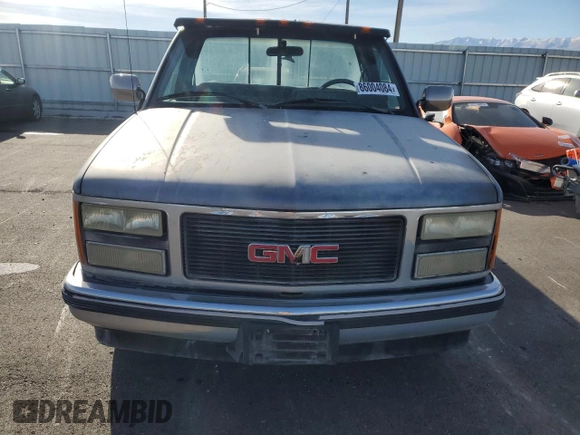 1990 GMC Sierra 1500 with VIN 1GTFC24K2LE554012, listed as a Copart auction lot 86004084 with 174,771 mi miles and Clean Title. Bid and sale history available at DreamBid. Image 5.