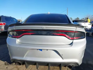 2020 Dodge Charger R/T with VIN 2C3CDXCT1LH219604, listed as a IAAI auction lot 41313469 with 58,665 mi miles and . Bid and sale history available at carsss.com. Image 17.