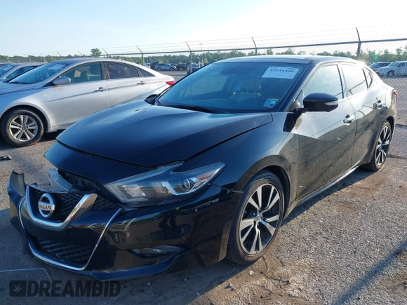 2018 Nissan Maxima SL with VIN 1N4AA6AP3JC401046, listed as a IAAI auction lot 42144400 with 86,330 mi miles and . Bid and sale history available at DreamBid. Image 2.