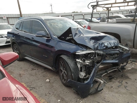 2016 BMW X1 xDrive28i with VIN WBXHT3C3XGP882221, listed as a IAAI auction lot 41581170 with 126,694 mi miles. Bid and sale history available at carsss.com. Image 1.