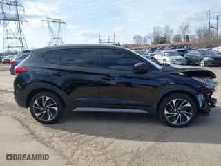 2021 Hyundai Tucson Sport with VIN KM8J3CAL6MU411855, listed as a IAAI auction lot 41694634 with 67,779 mi miles. Bid and sale history available at carsss.com. Image 14.